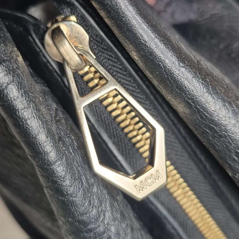 MCM Black Leather Handbag with Gold Accents